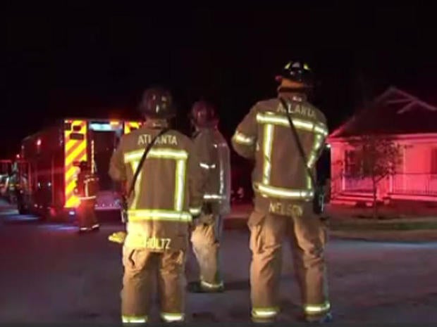 Train derails, crashes into Atlanta house and injures sleeping homeowner