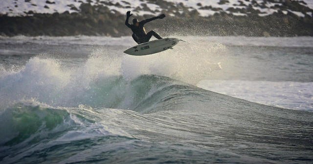 Surfers head to Norway to ride Arctic waves