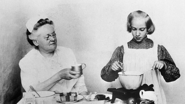 Fannie Farmer Watches Student Cook