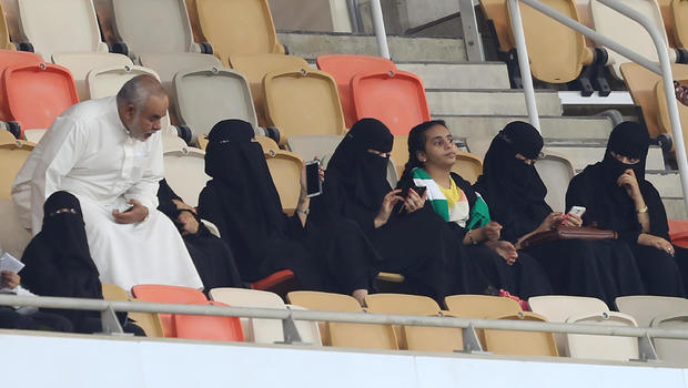 Saudi women allowed into stadiums for first time to watch soccer - CBS News