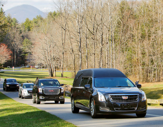 Hearse carrying body of evangelist Graham arrives at The Cove in Asheville, North Carolina 