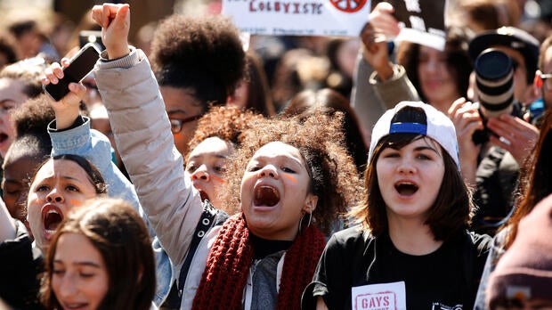 Youths take part in a national school walkout anti-gun march in Washington Square Park in the Manhattan borough of New York City April 20, 2018.