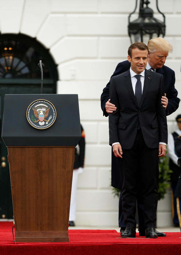U.S. President Donald Trump and first lady Melania Trump welcome French President Emmanuel Macron and his wife Brigitte Macron during an arrival ceremony at the White House in Washington 