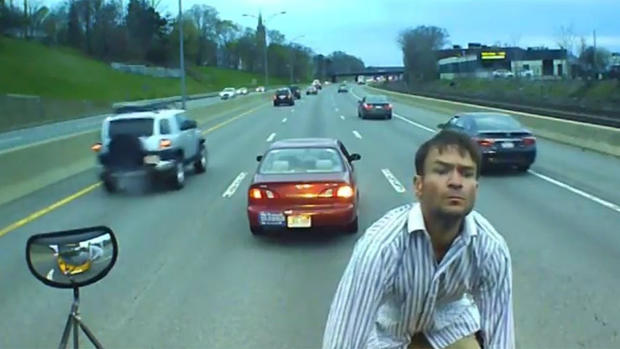 The bizarre incident on Massachusetts Turnpike was caught on dashboard camera.  CBS BOSTON
