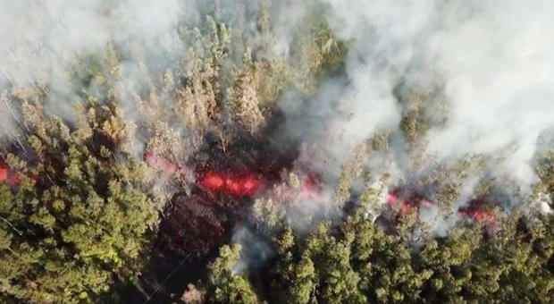 Lava emerges from the ground after Kilauea Volcano erupted, on Hawaii's Big Island 