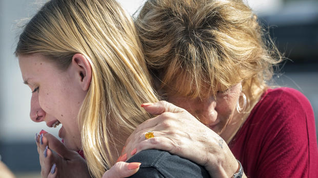 Santa Fe High School student Dakota Shrader is comforted by her mother Susan Davidson following a shooting at the school on May 18, 2018, in Santa Fe, Texas. 