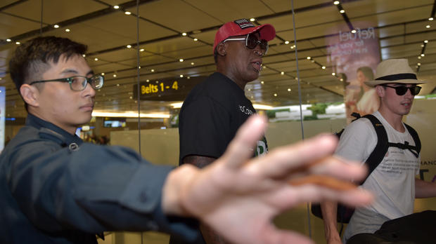 Retired American professional basketball player Dennis Rodman arrives at Changi International airport ahead of the U.S.-North Korea summit in Singapore on June 11, 2018. 