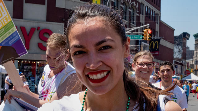 Alexandria Ocasio-Cortez marches during the Bronx's pride parade in the Bronx borough of New York City 