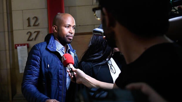 French rapper Rohff speaks to the media before his trial at a Paris courthouse on Sept. 29, 2017. The 39-year-old artist, whose real name is Housni Mkouboi, appeared before the Paris Criminal Court on a charge of aggravated violence stemming from an April 2014 incident in the Parisian shop of his rival, French rapper Booba.