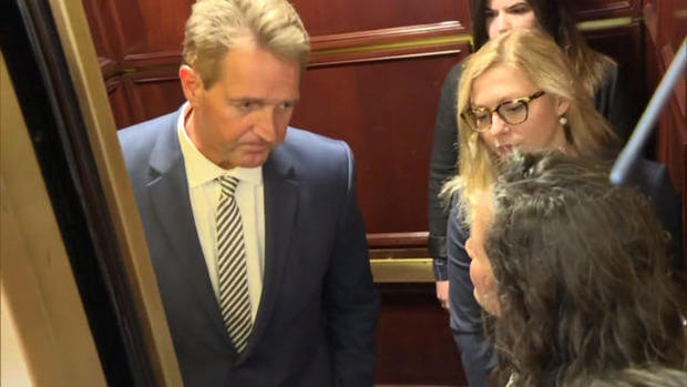 cbsn-fusion-sen-jeff-flake-confronted-by-protesters-in-elevator-brett-kavanaugh-vote-thumbnail-1669225-640x360.jpg 