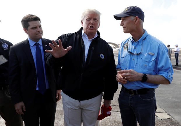 U.S. President Trump is greeted as he arrives for tour of Hurricane Michael storm damage at Eglin Air Force Base, Florida 