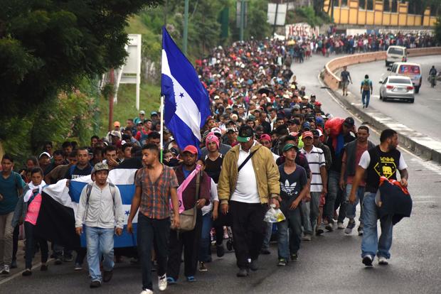 Image result for Migrants waving honduran flag