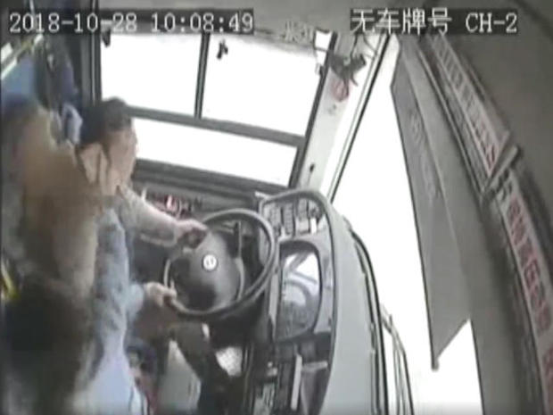 woman-passenger-battles-with-bus-driver-in-china-before-bus-plunges-off-bridge-102818.jpg 
