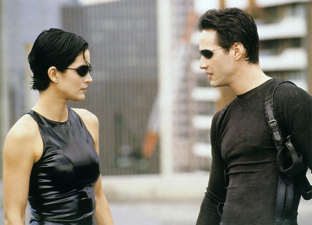 THE MATRIX, Carrie-Anne Moss, Keanu Reeves, 1999. ©Warner Bros./courtesy Everett Collection 