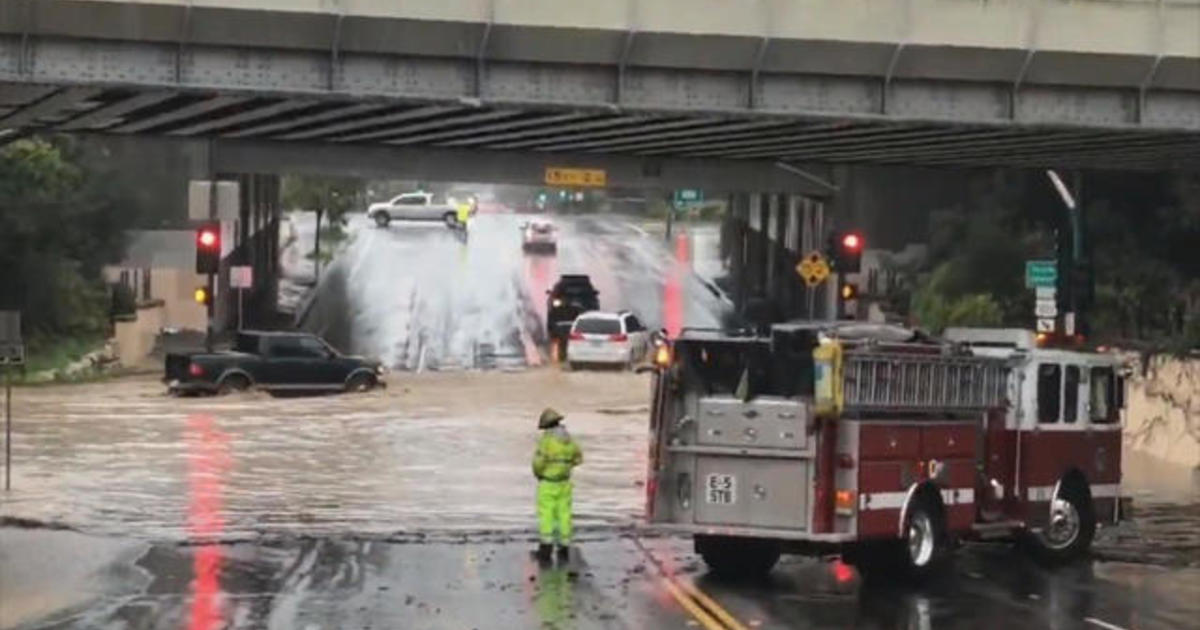 Powerful storm hits Southern California, flooding highway CBS News