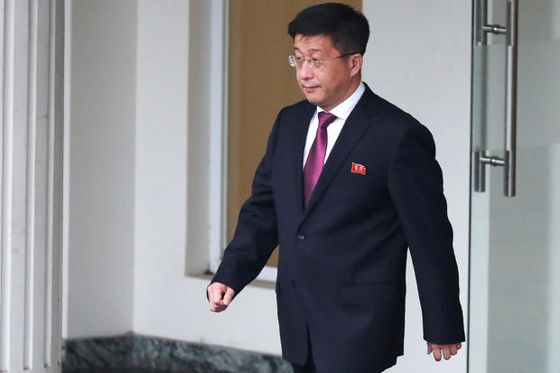 FILE PHOTO: Kim Hyok Chol, North Korea's special representative for U.S. affairs, leaves the Government Guesthouse in Hanoi 