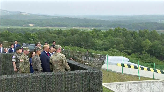 U.S. President Donald Trump and South Korean President Moon Jae-in are seen at the demilitarized zone (DMZ) separating the two Koreas, in Paju 