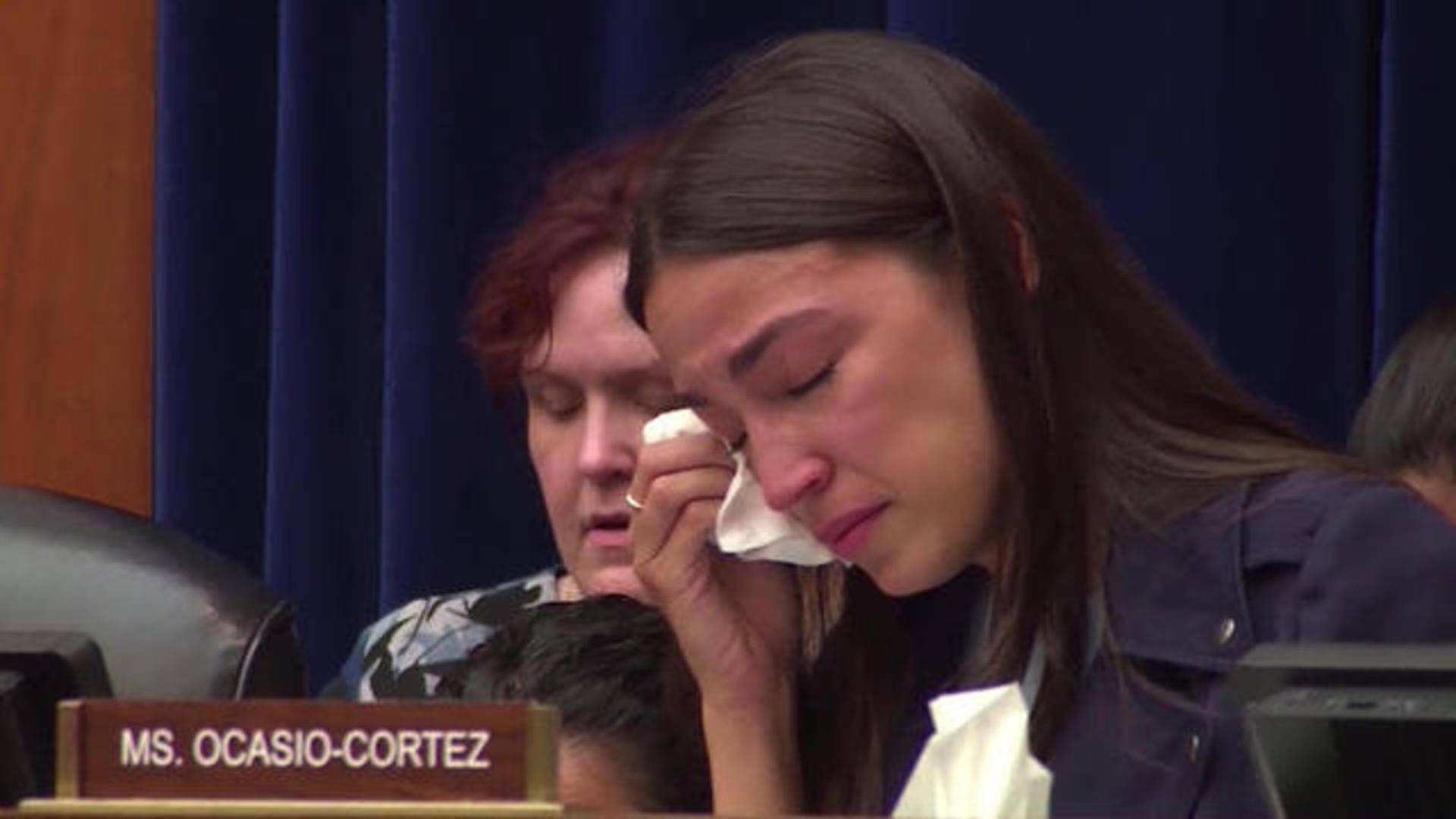 Alexandria Ocasio-Cortez tears up while hearing story of child who died  after being held by ICE - CBS News