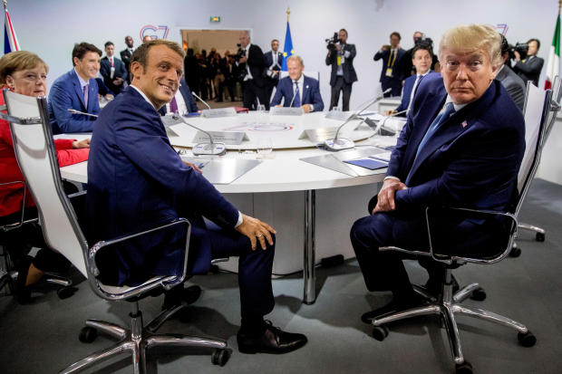 French President Emmanuel Macron and President Trump participate in a G-7 Working Session on the Global Economy, Foreign Policy, and Security Affairs at the G-7 summit in Biarritz, France, on August 25, 2019. (Credit: AP)