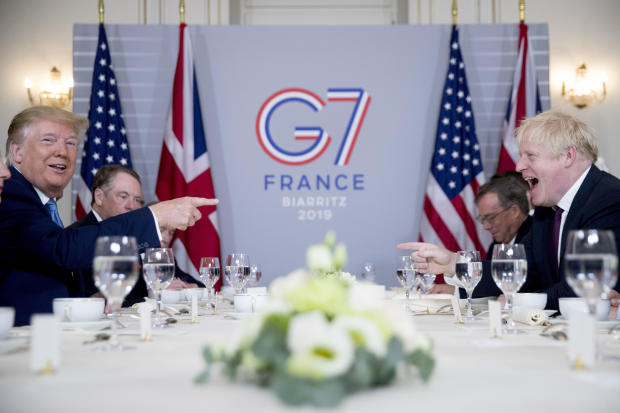 President Trump and Britain's Prime Minister Boris Johnson attend a working breakfast at the Hotel du Palais on the sidelines of the G-7 summit in Biarritz, France, on August 25, 2019. (Credit: AP)