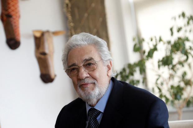 FILE PHOTO: Opera singer Placido Domingo sits during an event at the Manhattan School of Music in New York 