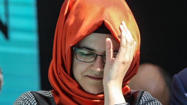 Hatice Cengiz, fiancee of murdered Saudi journalist Jamal Khashoggi, cries during a ceremony near Saudi Arabia's consulate in Istanbul, Turkey, marking the one-year anniversary of Khashoggi's death on October 2, 2019.