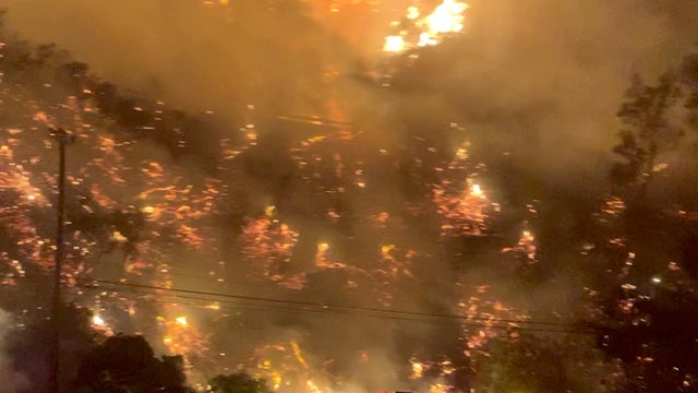 A wildfire is seen near the Getty Center in Los Angeles October 28, 2019, in this screen grab obtained from a social media video. 