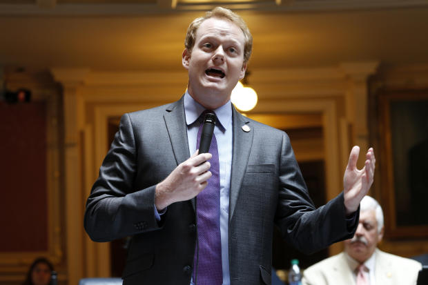 Democratic Delegate Chris Hurst of Montgomery, Virginia, gestures during an impassioned floor speech during a special legislative session on gun issues at the State Capitol in Richmond on July 9, 2019. 