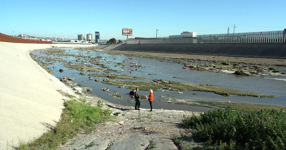 Raw sewage flowing into the Tijuana River brings toxic sludge to