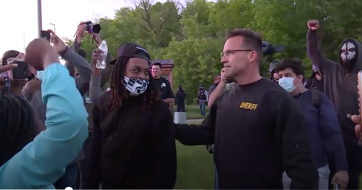 Sheriff joins protesters marching for George Floyd thumbnail