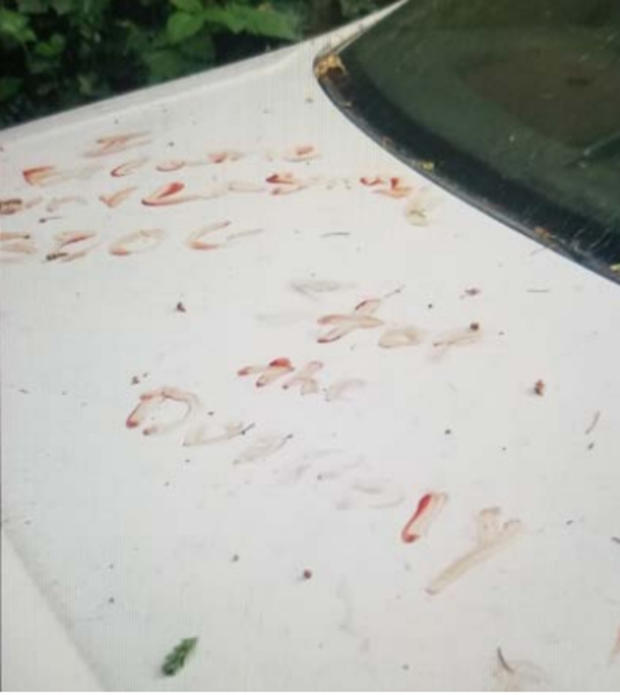 Carillo evidence photo writing in blood on car 