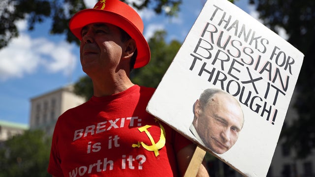Anti-Brexit demonstrator Steve Bray holds a placard as he protests outside Downing Street in London