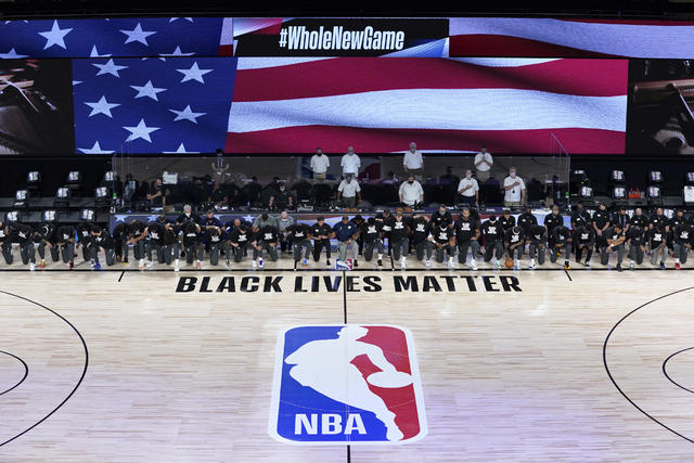 Nba Players And Coaches Kneel During National Anthem As Season Restarts Cbs News