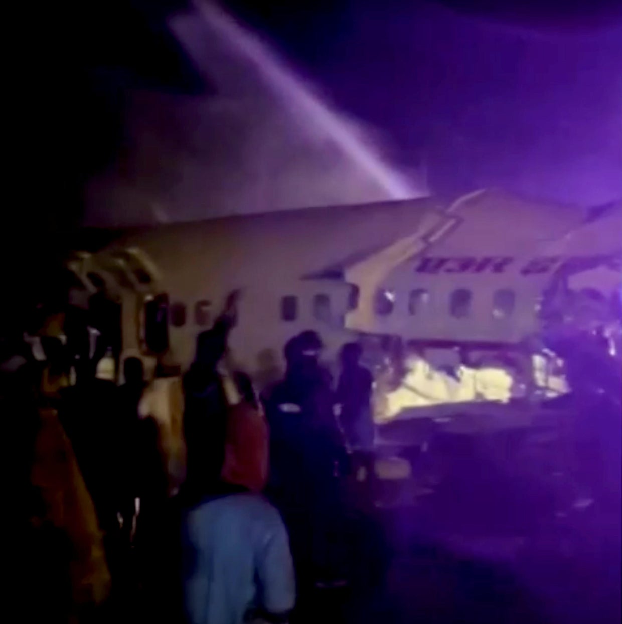 Air India Express plane skids off runway, killing at least 18 and
