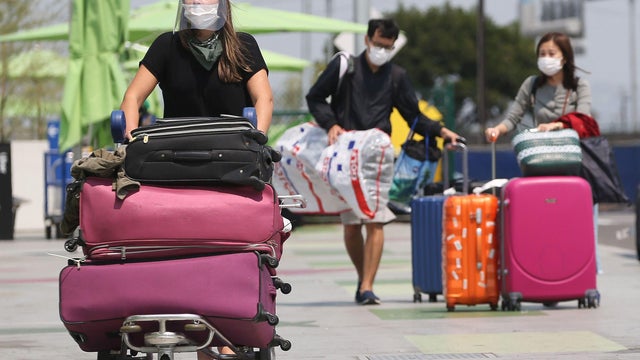Travelers at LAX airport 