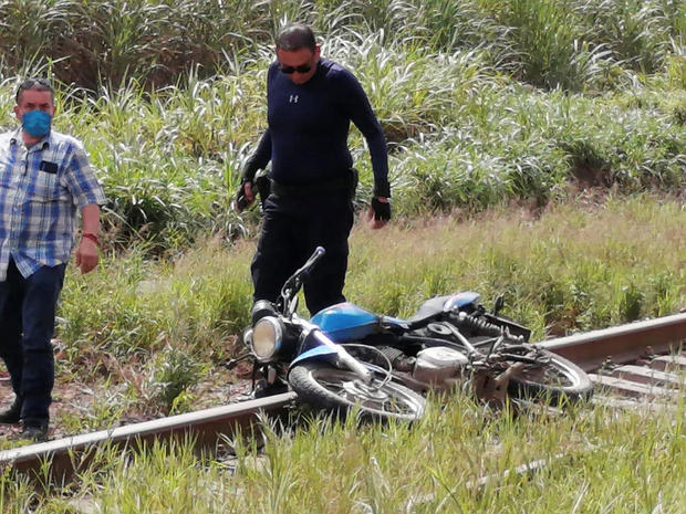 A motorcycle is seen at the site where the body of journalist Julio Valdivia was found in Tezonapa 