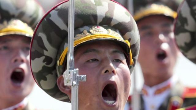 Kim Jong Un ordered executions amid frantic efforts to control coronavirus, South Korea lawmaker says - CBS News