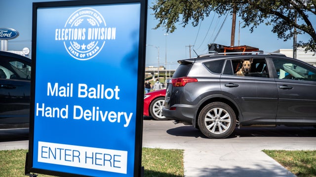 People Go To The Polls On First Day Of Early Voting In Texas