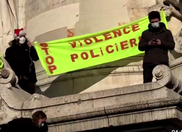 Paris police officers under investigation after video of beating spurs outrage - CBS News