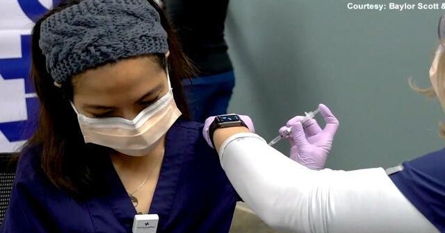COVID vaccines provide glimmer of hope as surge continues nationwide
