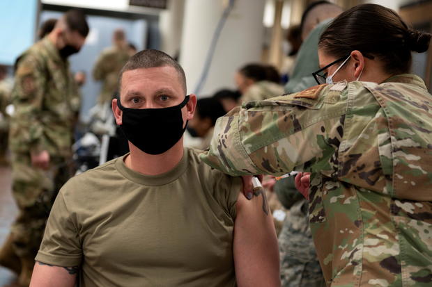 A U.S. Air Force soldier gets a coronavirus disease (COVID-19) vaccine at Osan Air Base in Pyeongtaek 