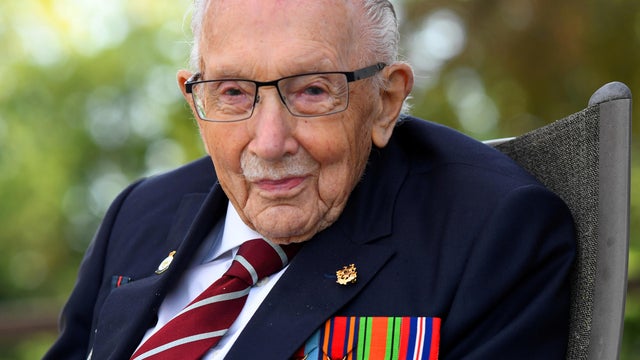 FILE PHOTO: Captain Sir Tom Moore smiles as he launches his autobiography book at his home in Milton Keynes 