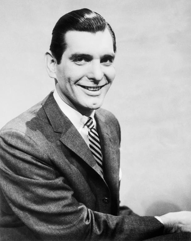 Portrait of Emcee Sonny Fox Smiling and Wearing Suit and Tie 