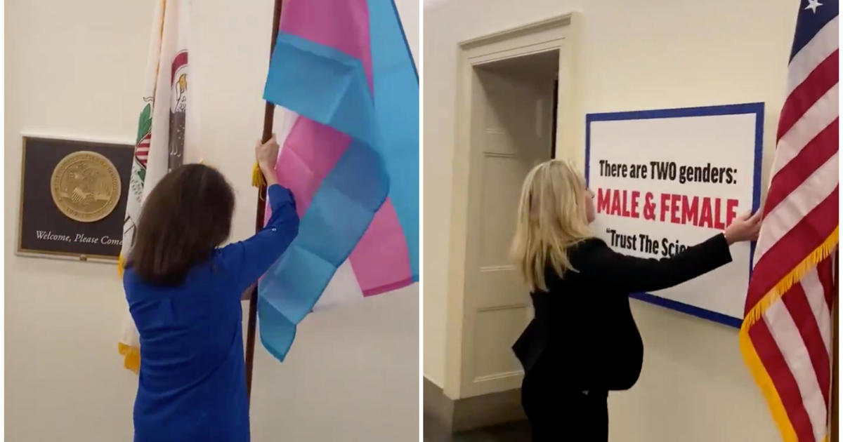 Marjorie Taylor Greene said he hung an anti-trans sign outside the office as a result of heightening the debate over the equality law