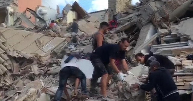 Rescue crews search for survivors after earthquake rocks Italy