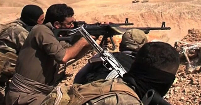 Militants fight Iraqi forces for key refinery