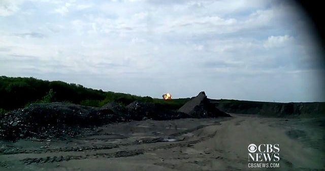 RAW VIDEO: Burning Malaysia Airlines wreckage seen in amateur video