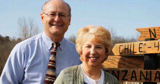 Husband of Ebola patient says she is improving