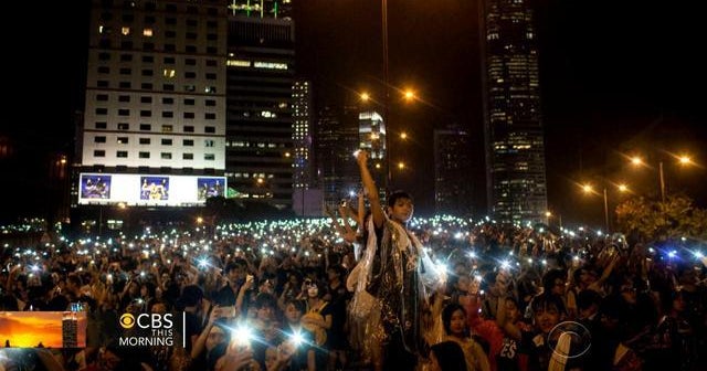 Protests grow amid celebrations in Hong Kong