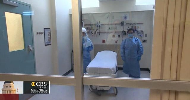 Officials curbing Ebola fear while adding safeguards